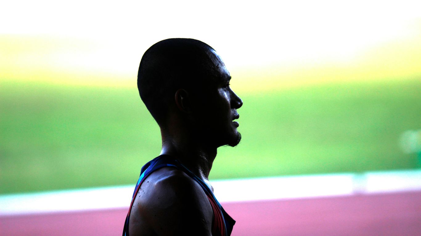 man in black and red tank top