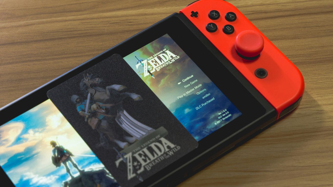 a nintendo switch sitting on top of a wooden table