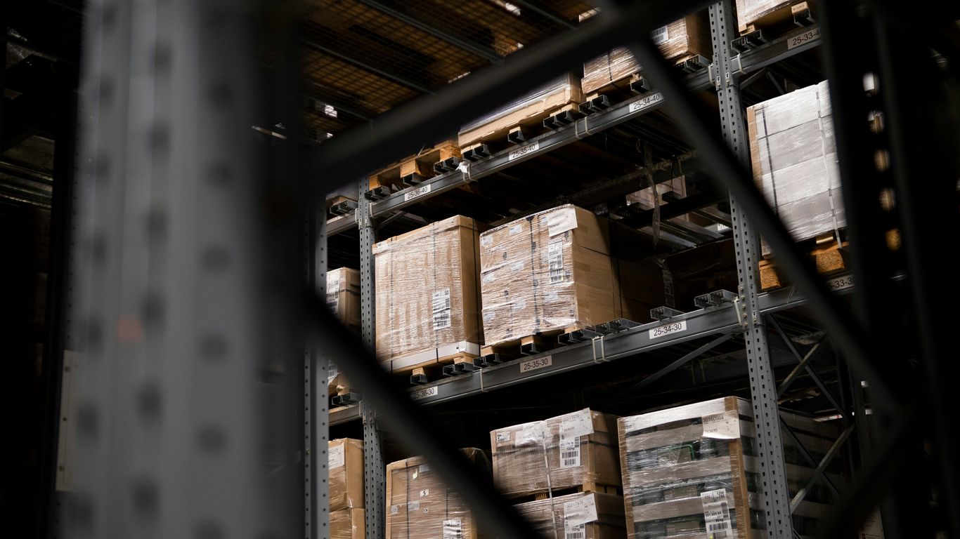 Protective drinkware cartons stacked on pallets