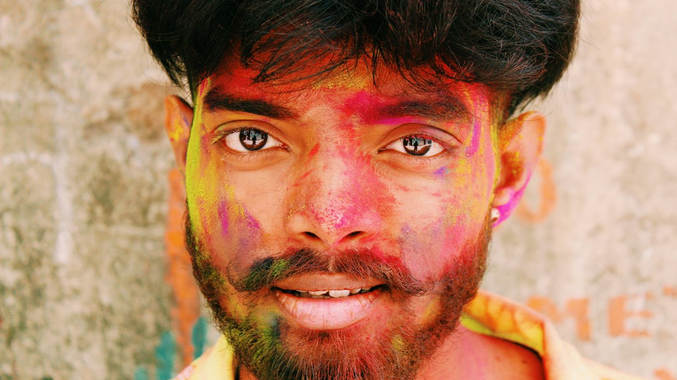 man with blue and brown hair