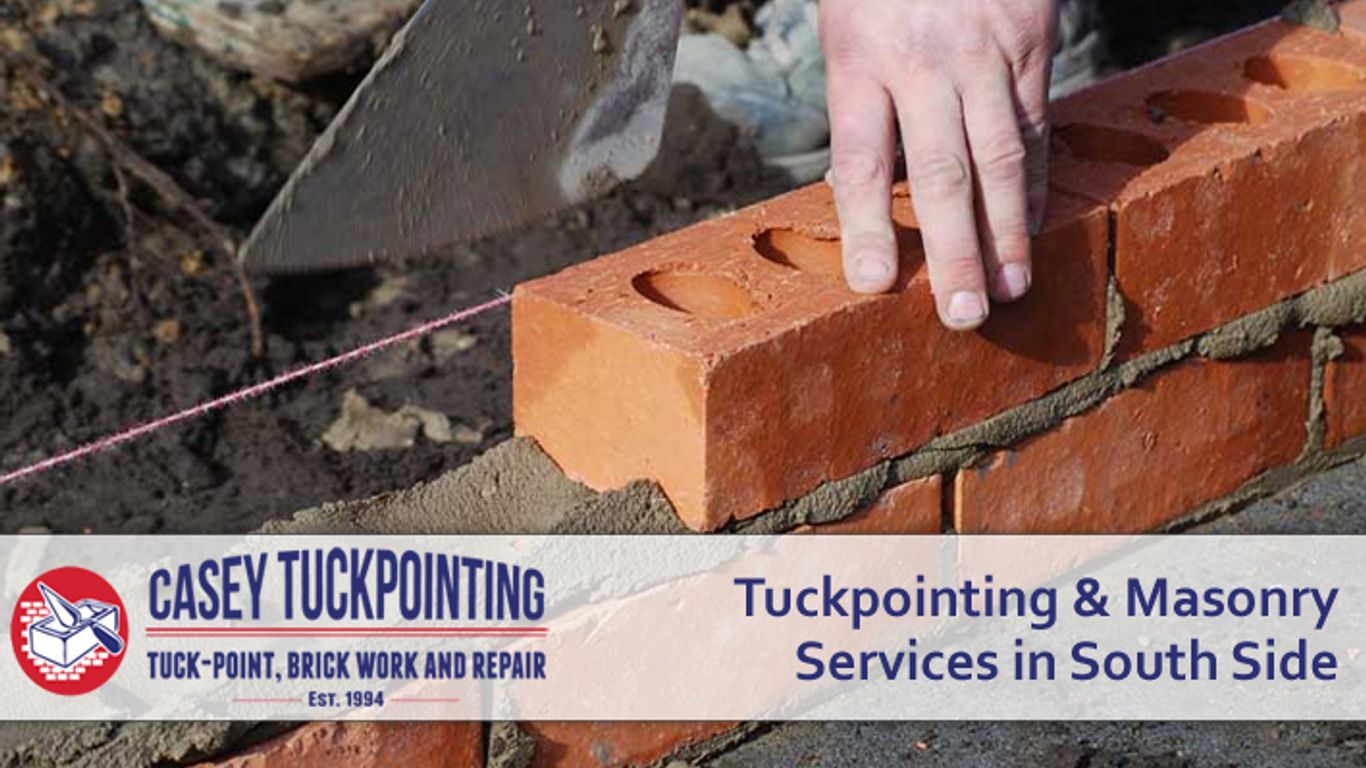 Masonry work in progress with bricks and mortar.