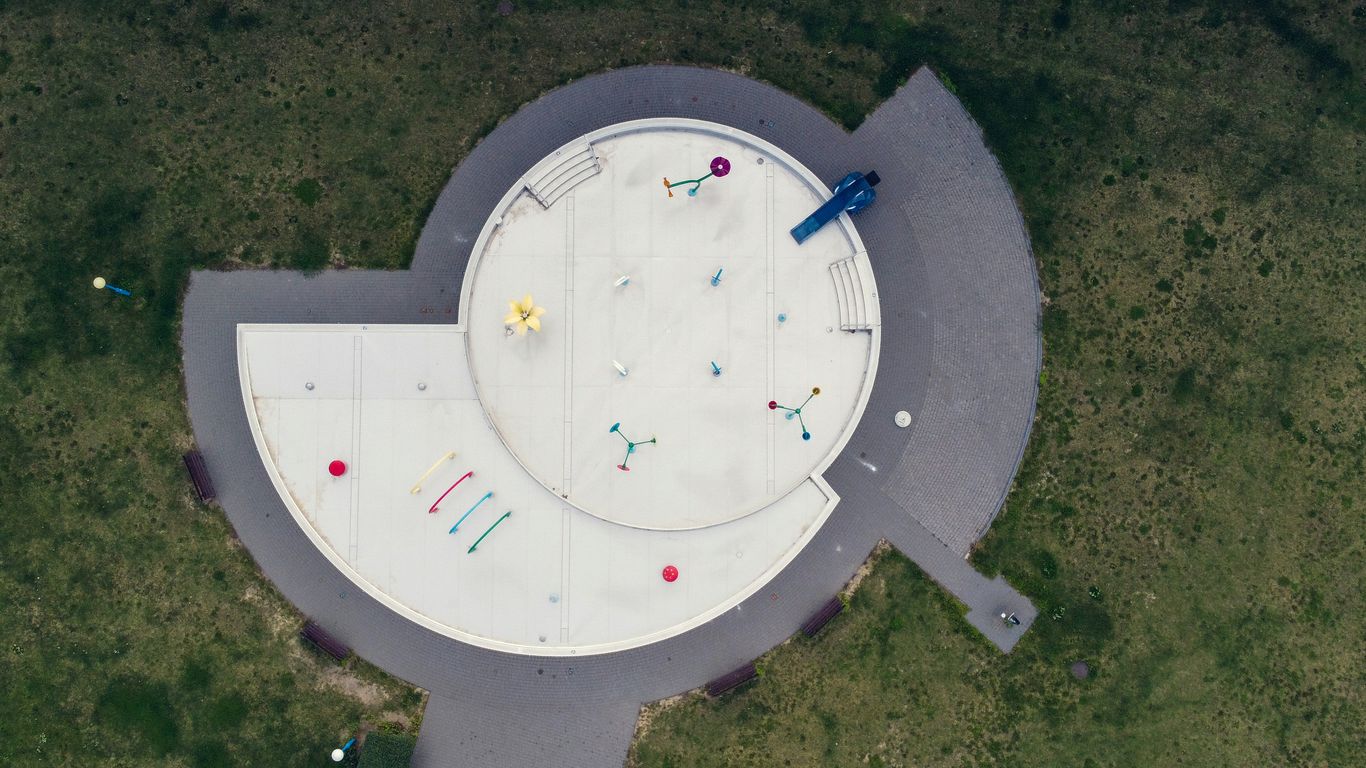 Mosaic dragon playground beside HDB blocks