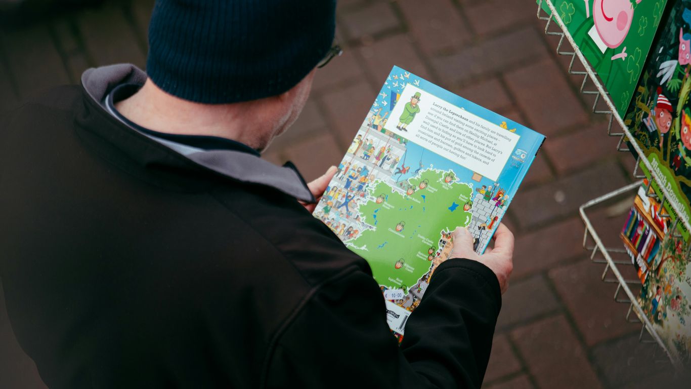 Man looking at a map of ireland