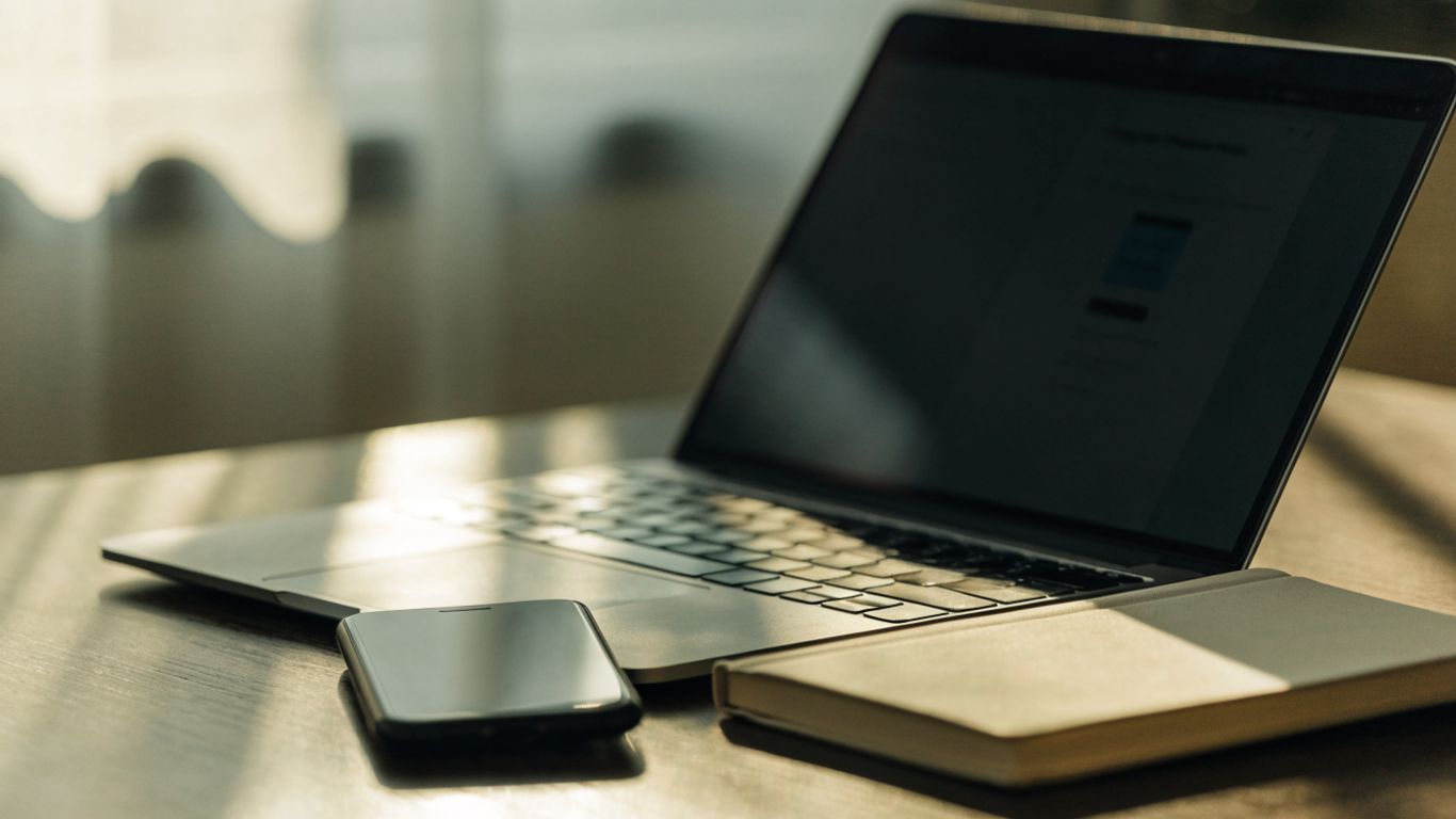 A close view of a laptop and payment confirmation screen