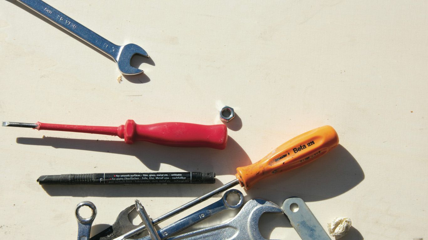 Professional tools laid out for custom acrylic fabrication