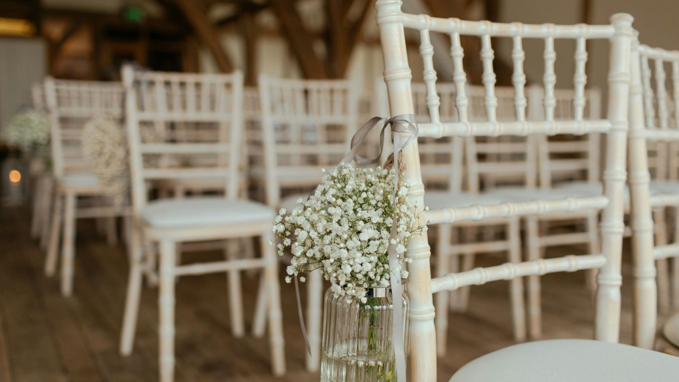 A beautifully decorated wedding aisle in the hall