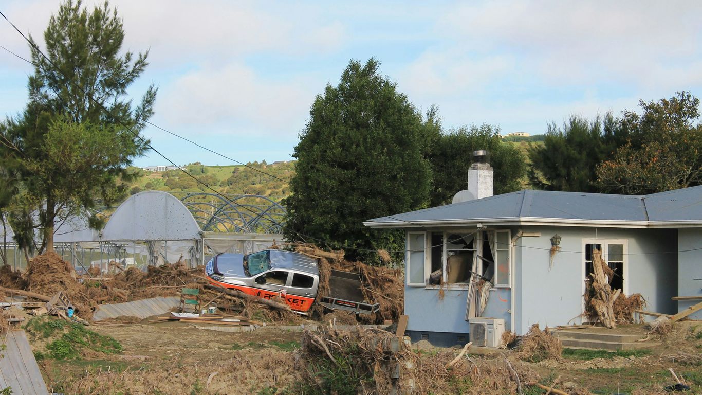 a house with a car parked in front of it