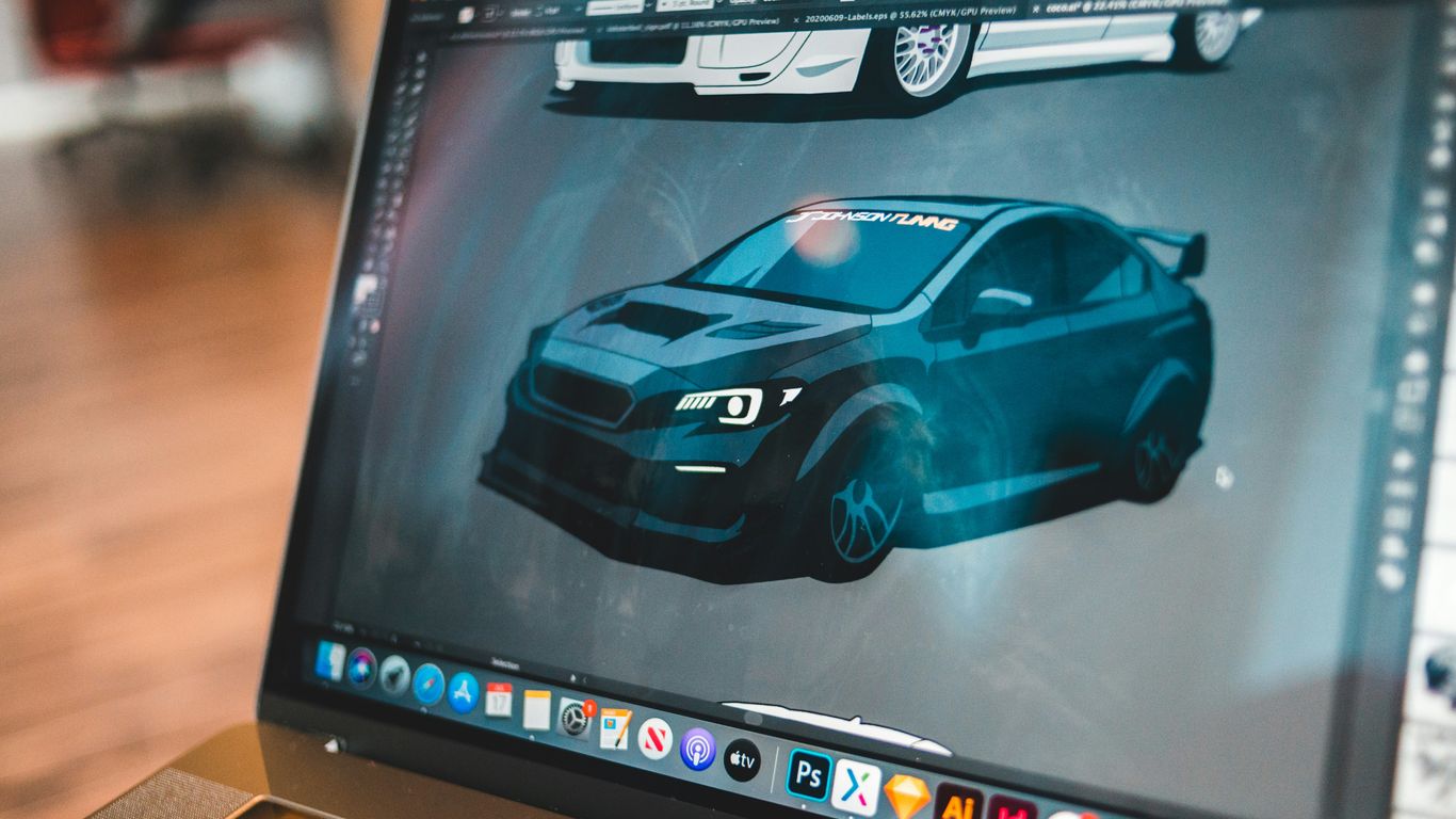 black and blue car on black dell laptop computer