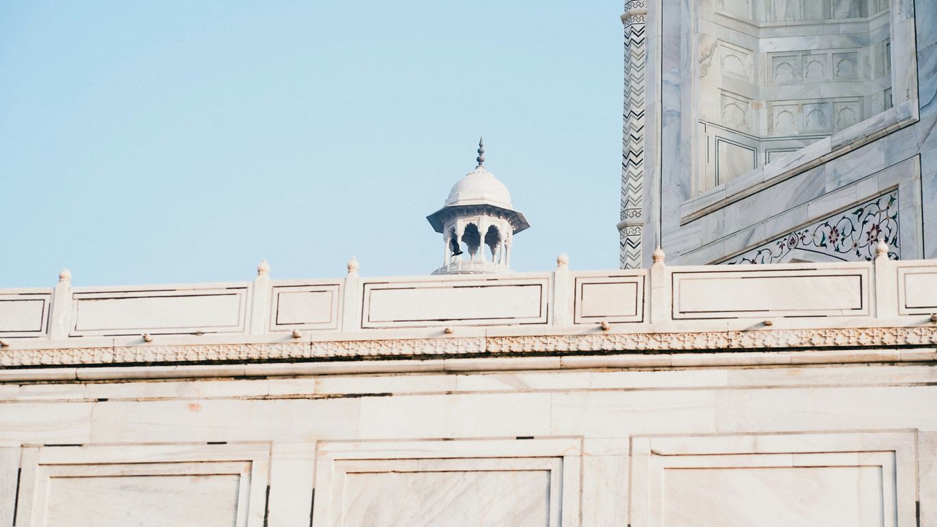 A building with a clock on the top of it