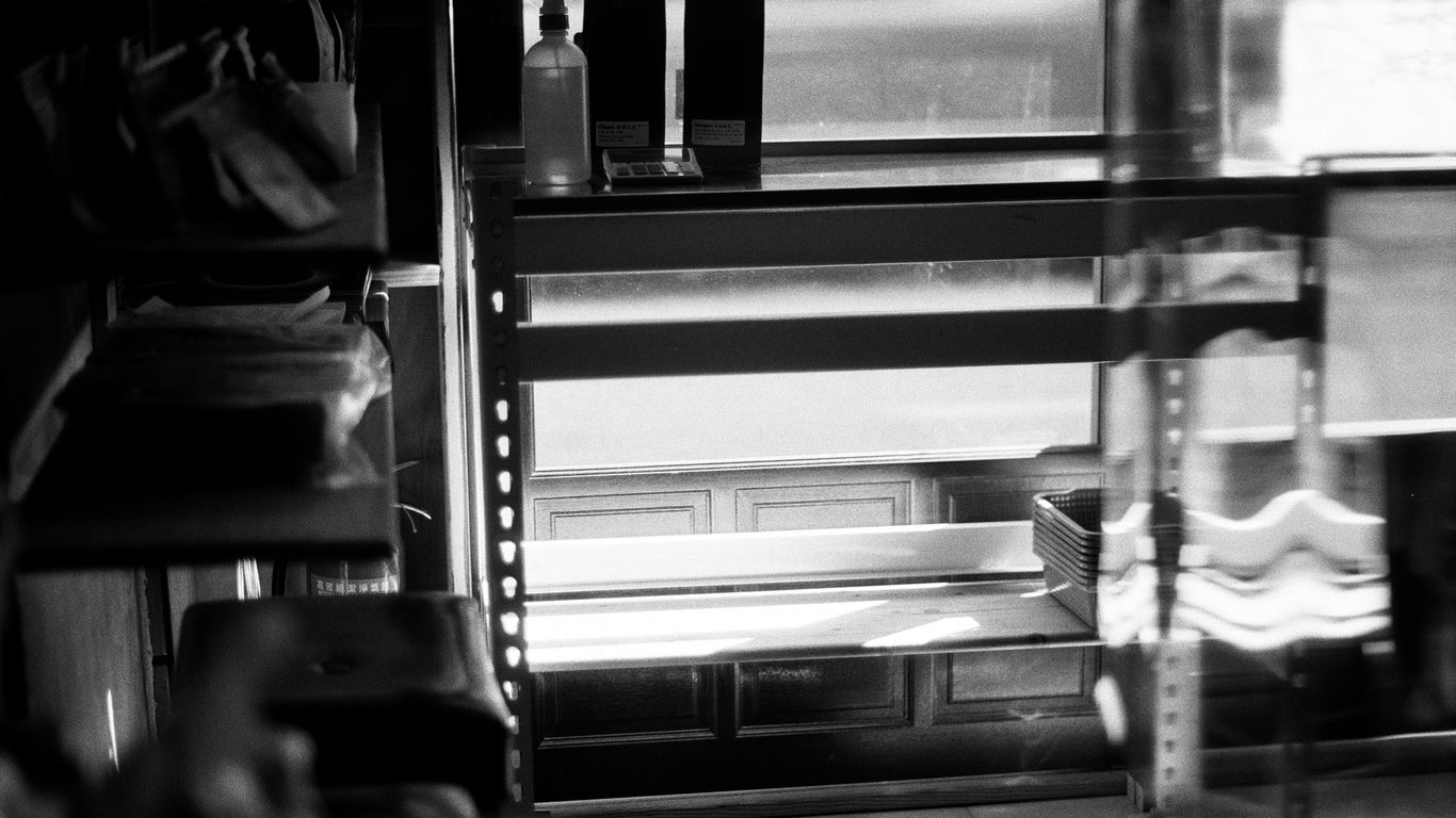 grayscale photo of train station