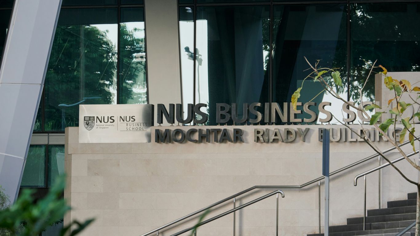 there is a sign that says in business on the side of a building