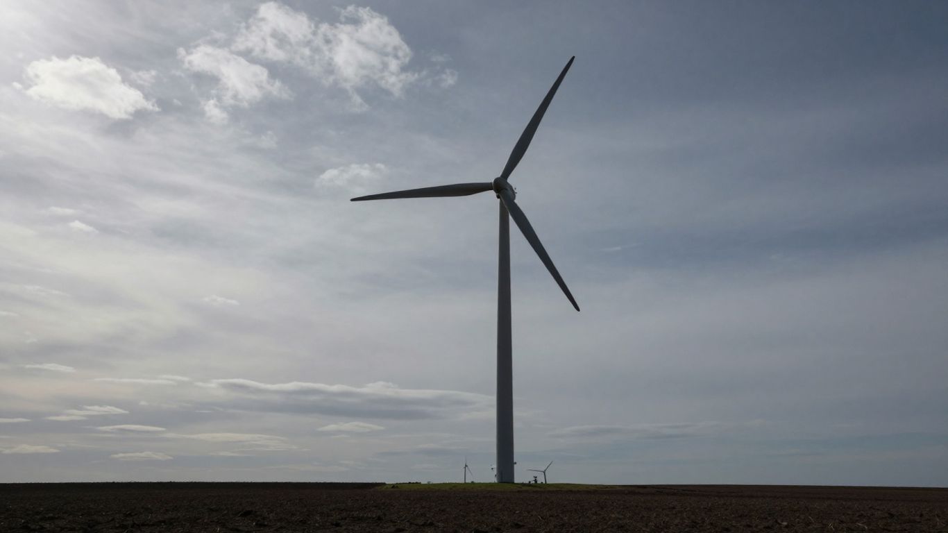 Inactive wind turbine on a cloudy day.