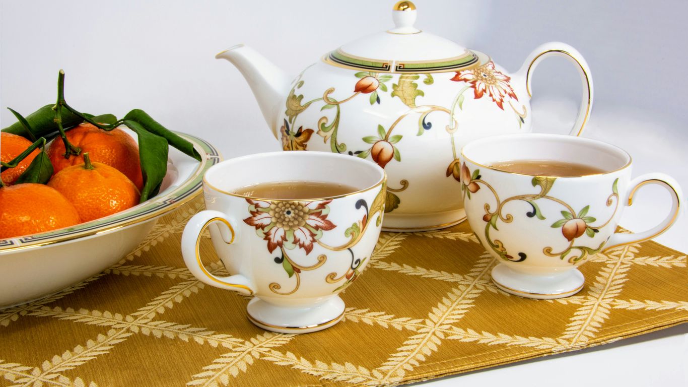 Blanc de Chine tea set and figurine display