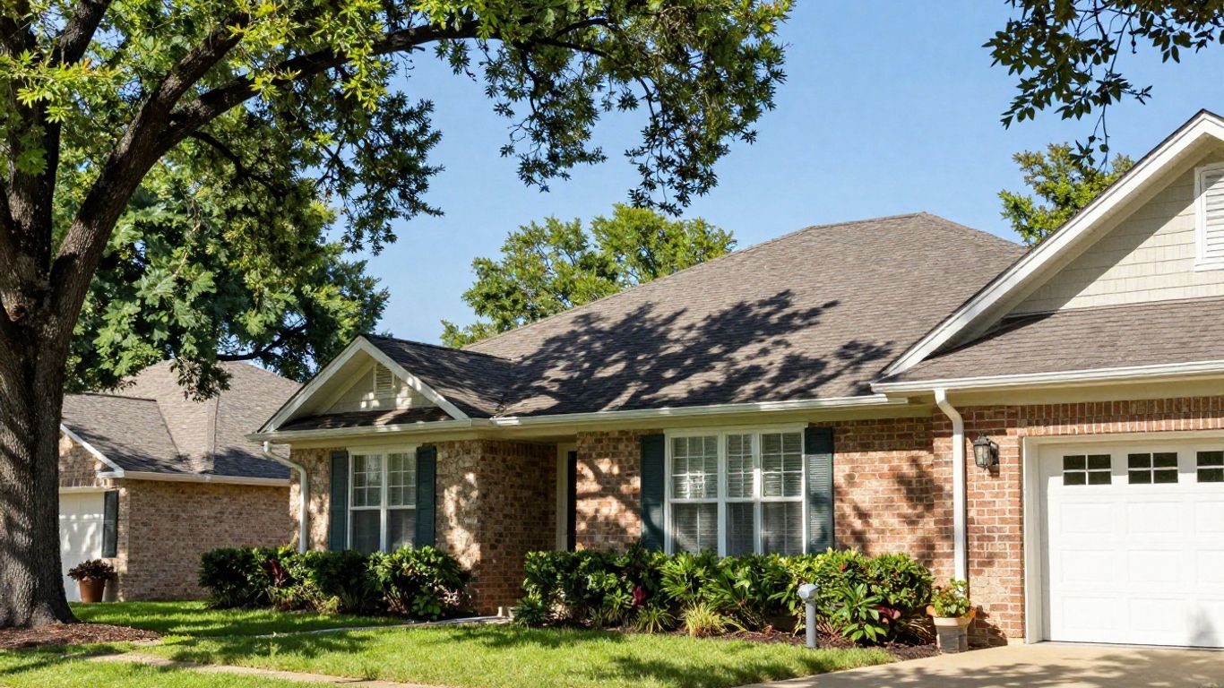 New Braunfels house with clean gutters under a sunny sky.
