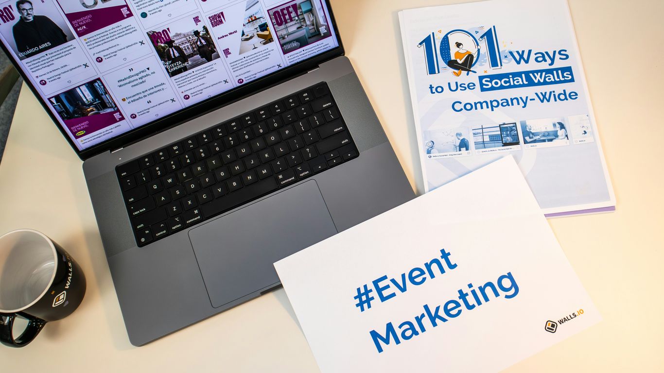 a laptop computer sitting on top of a desk