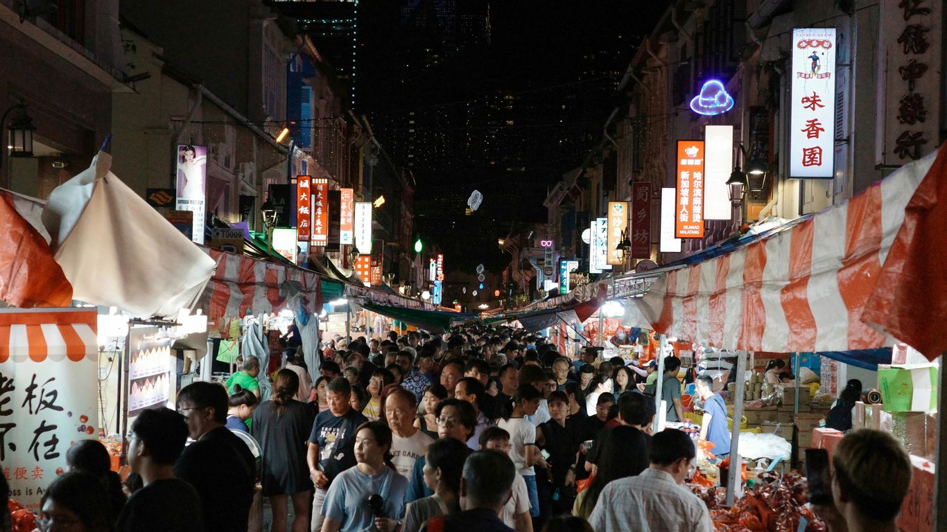 Busy food market with diverse crowds
