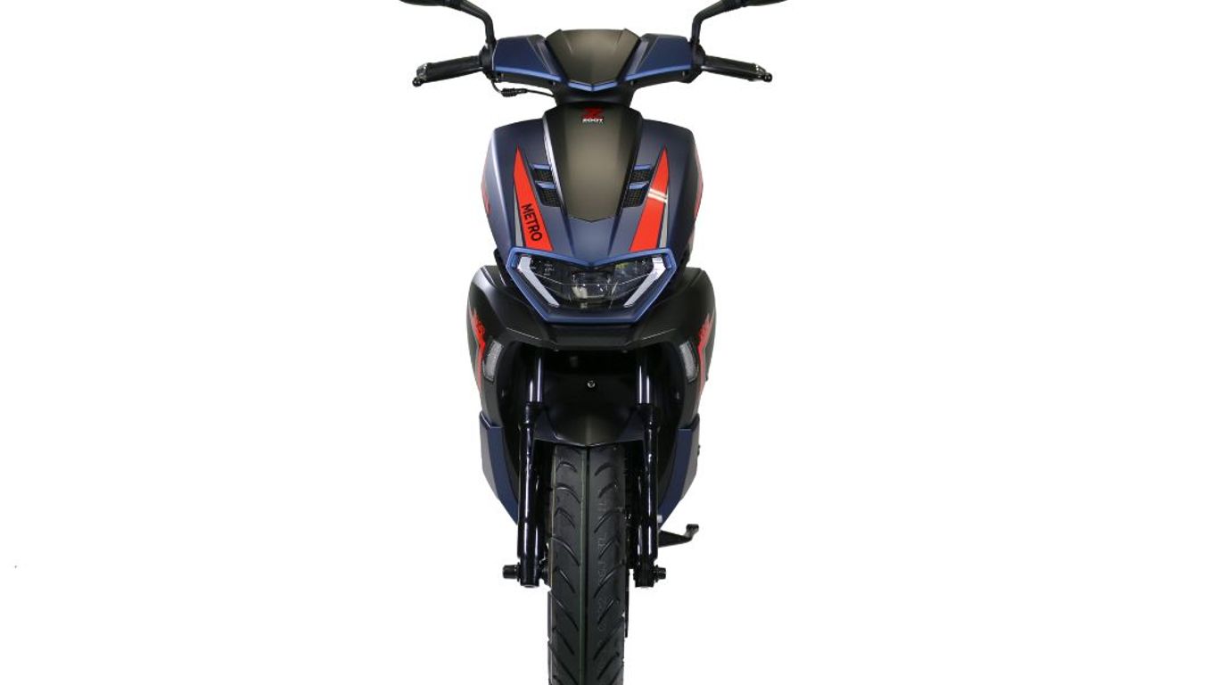 A front view of a dark blue and red scooter with the word METRO on it.