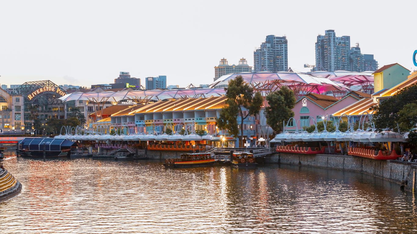 Historic Singapore river with working boats