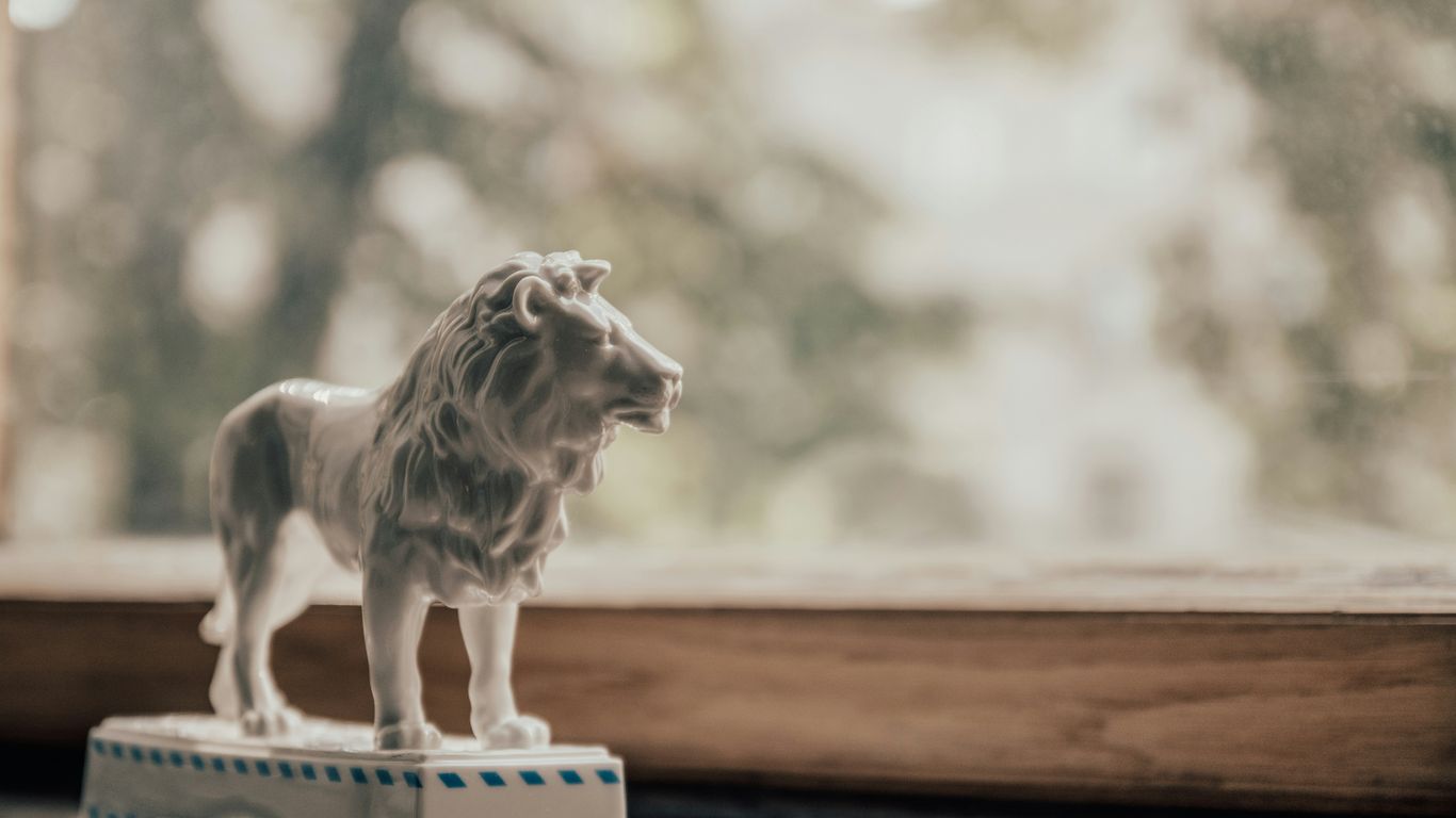 White Dehua porcelain figurine on table