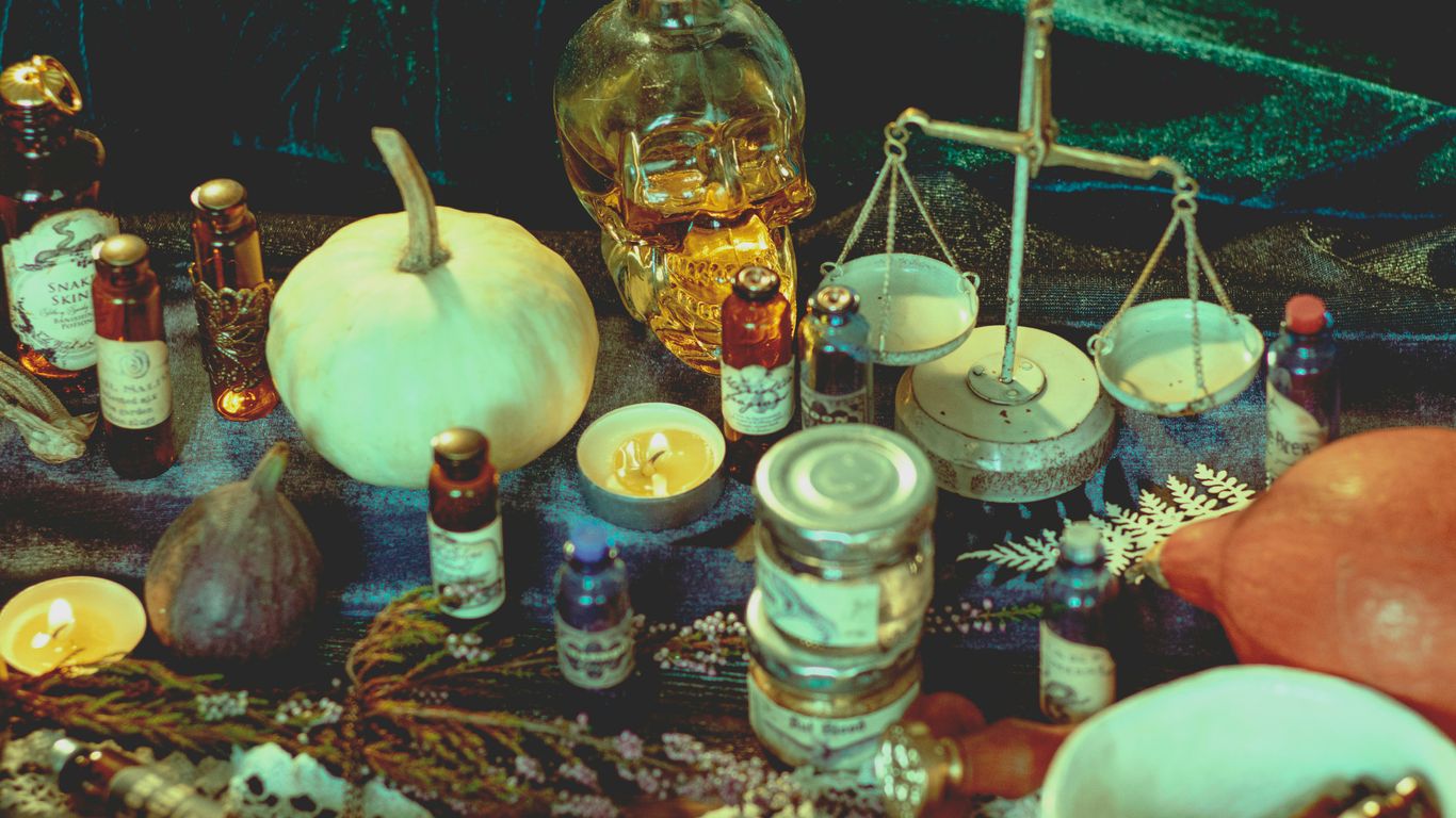 gold and white round ornament on table