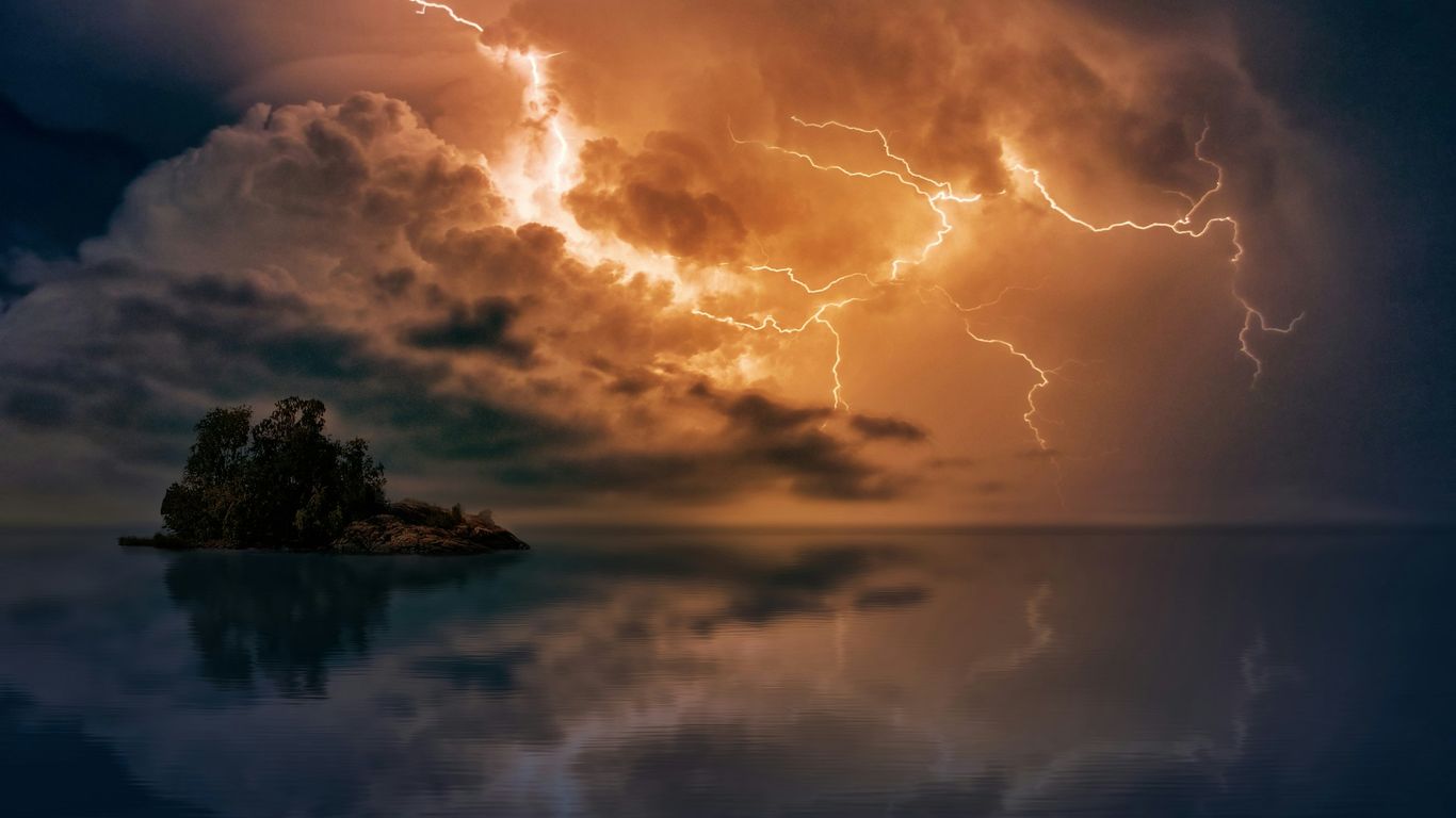 photo of island and thunder