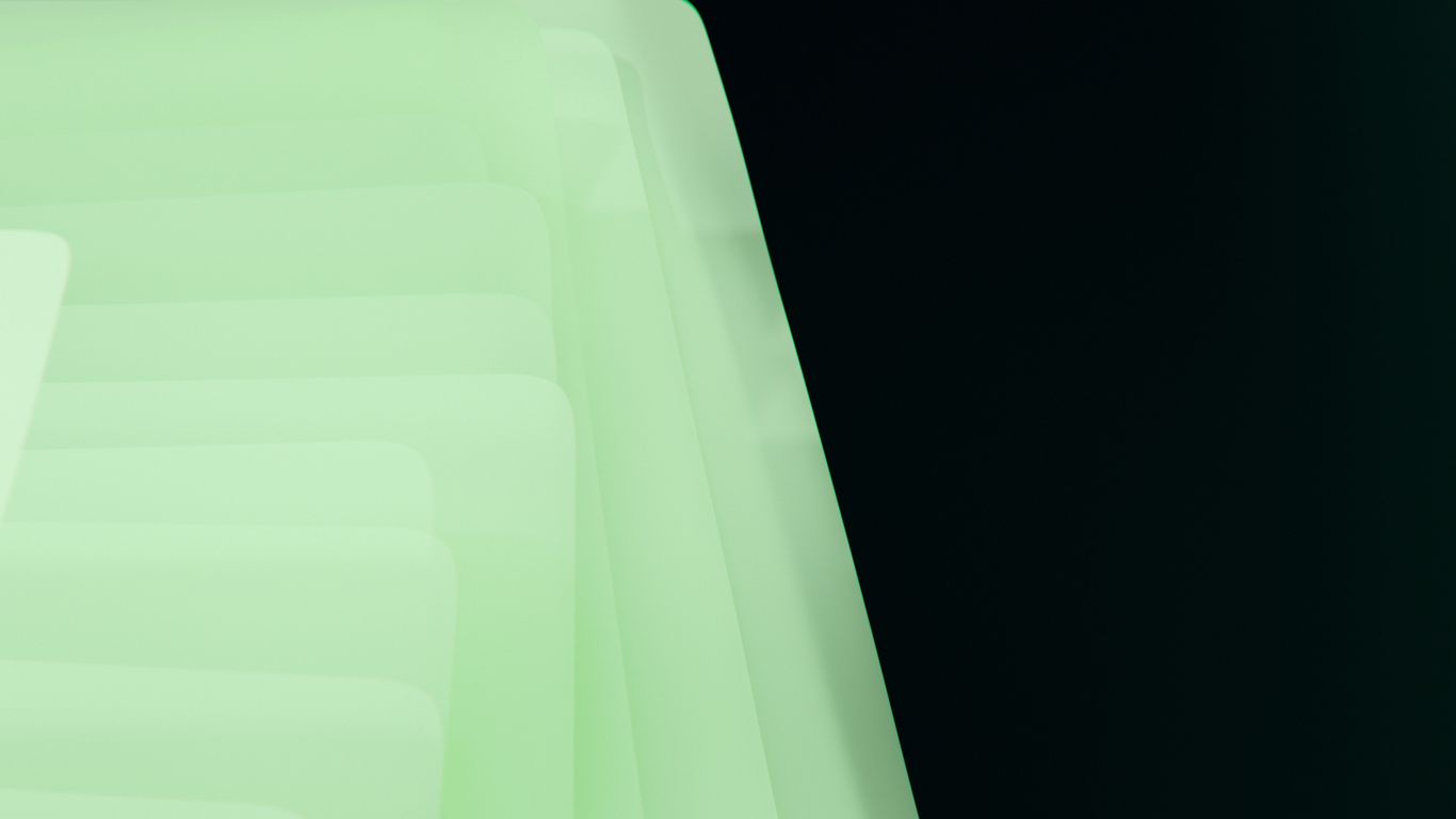 A close up of a green object with a black background