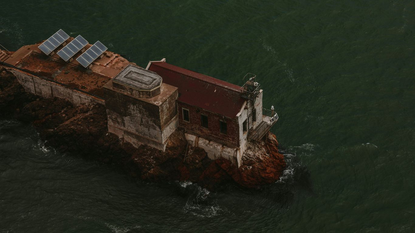 brown building with solar panel on top