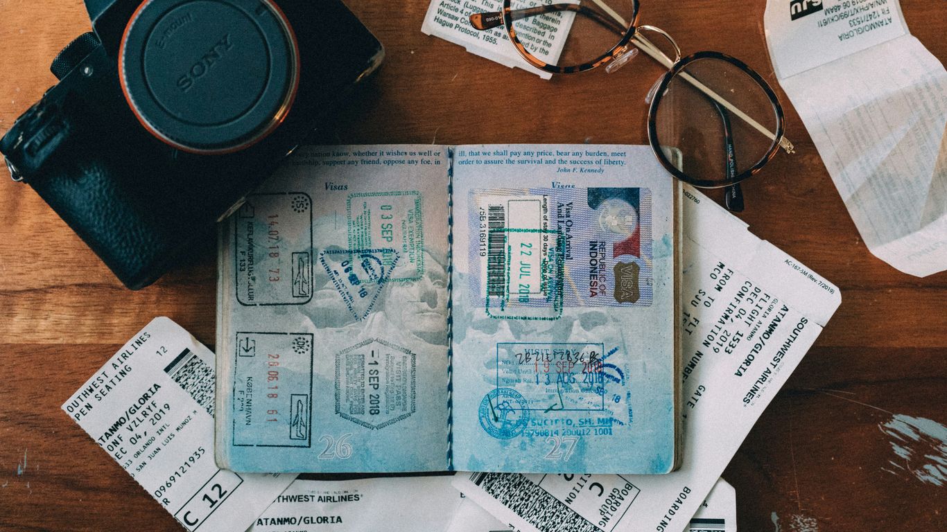 Customs documents beside packed equipment
