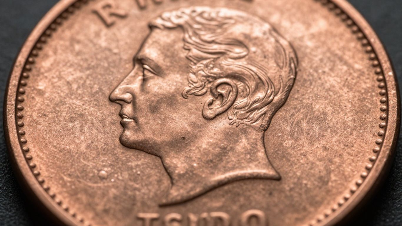 A closeup view of a coin showing detailed clash markings