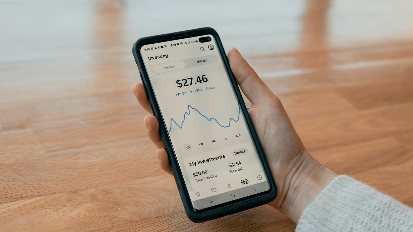 person holding black android smartphone