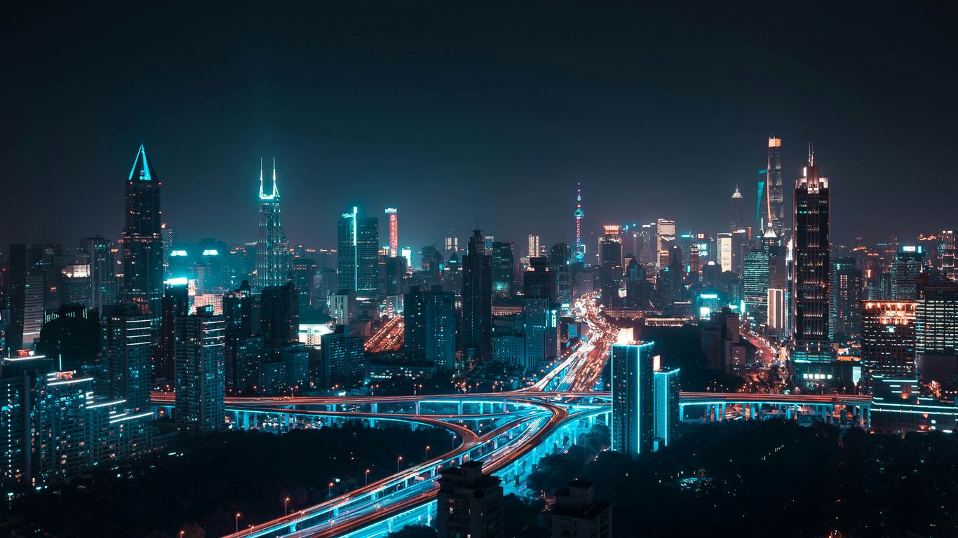 The city lights shining over the urban landscape