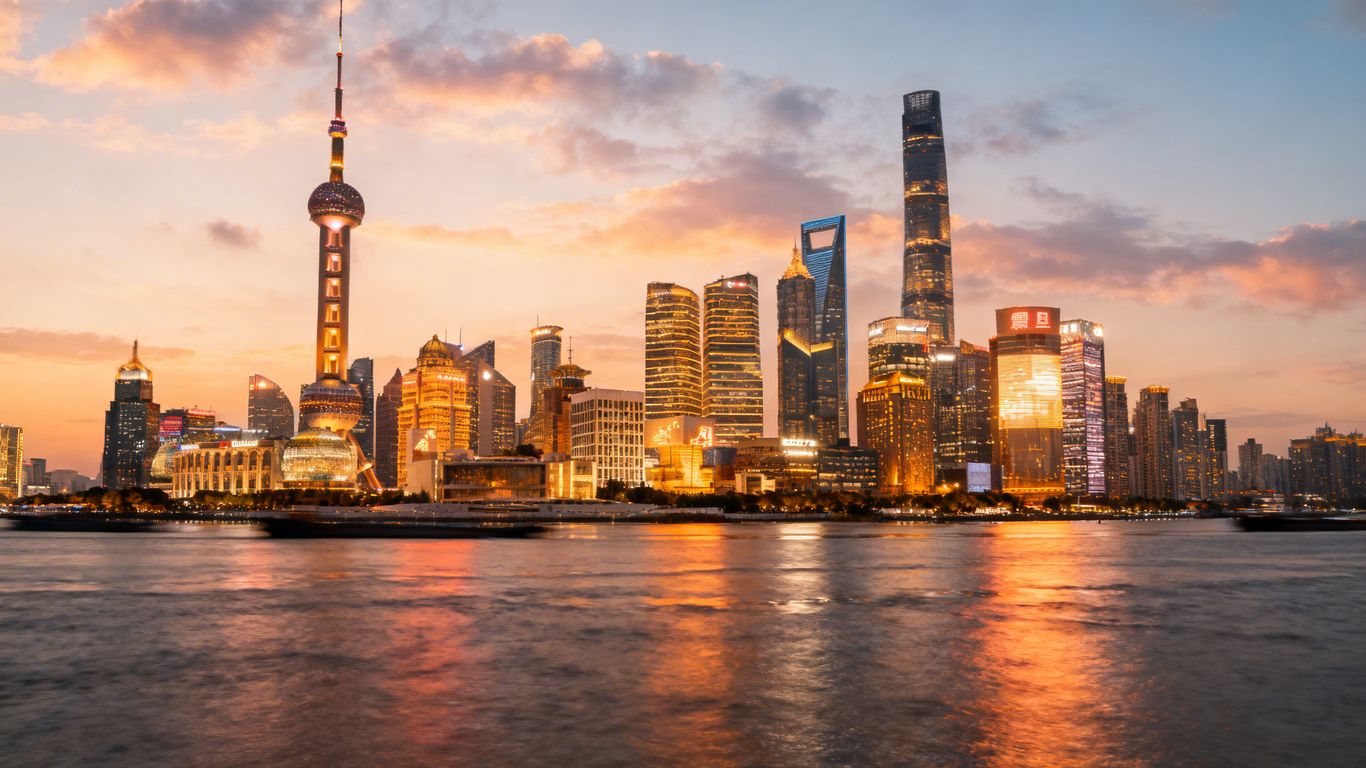 Shanghai skyline at dusk, symbolizing global finance.