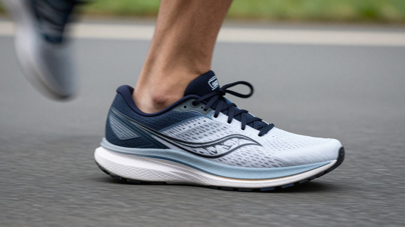 Saucony Tempus 3 running shoe in motion on a road.