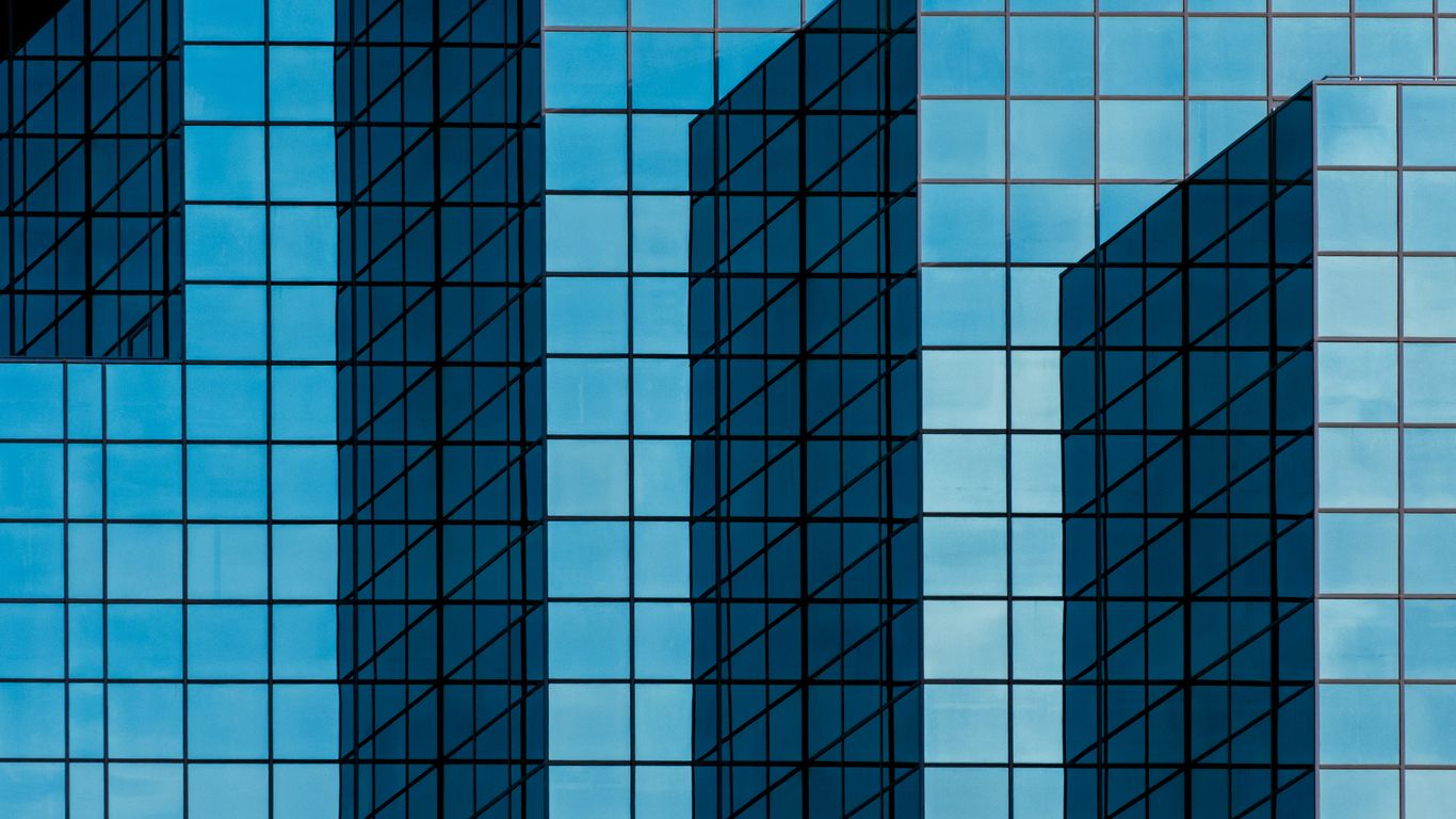 blue and white glass walled building