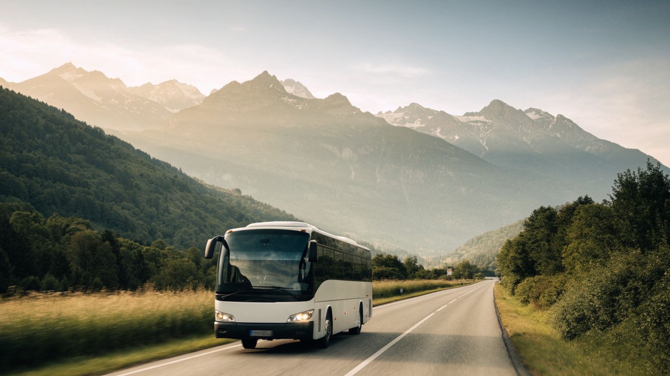 Bus traveling through Alpine countryside toward Annecy