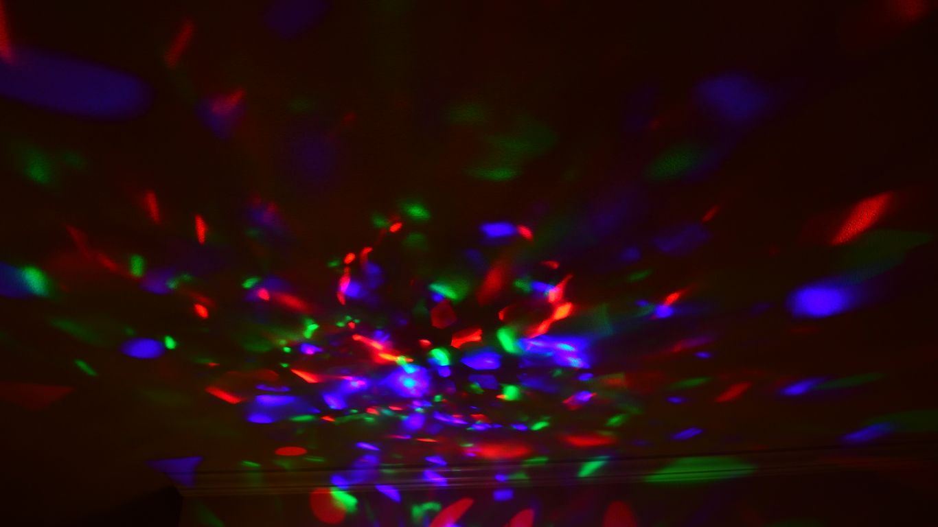 a room filled with lots of colorful lights