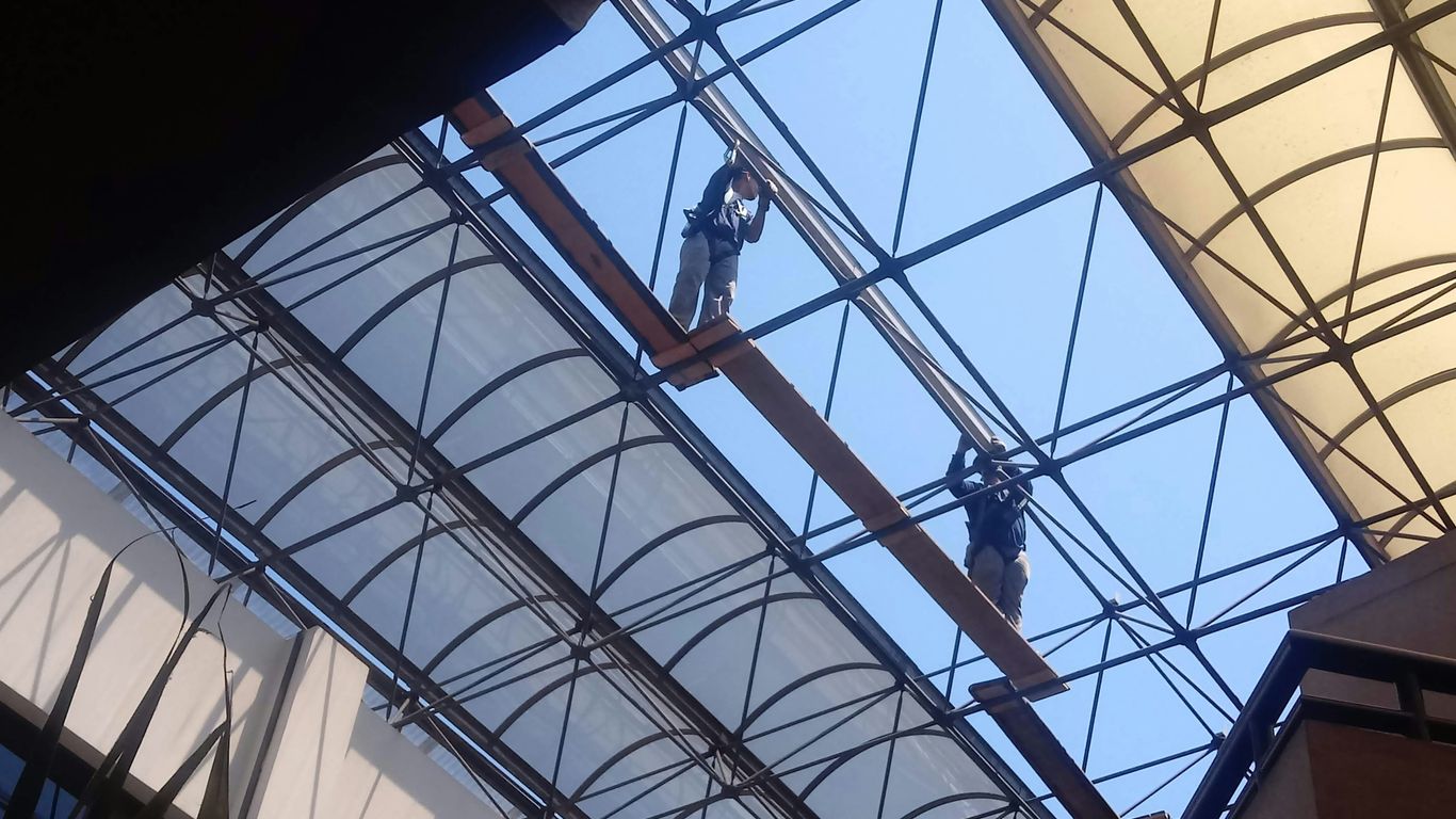 white metal framed glass roof