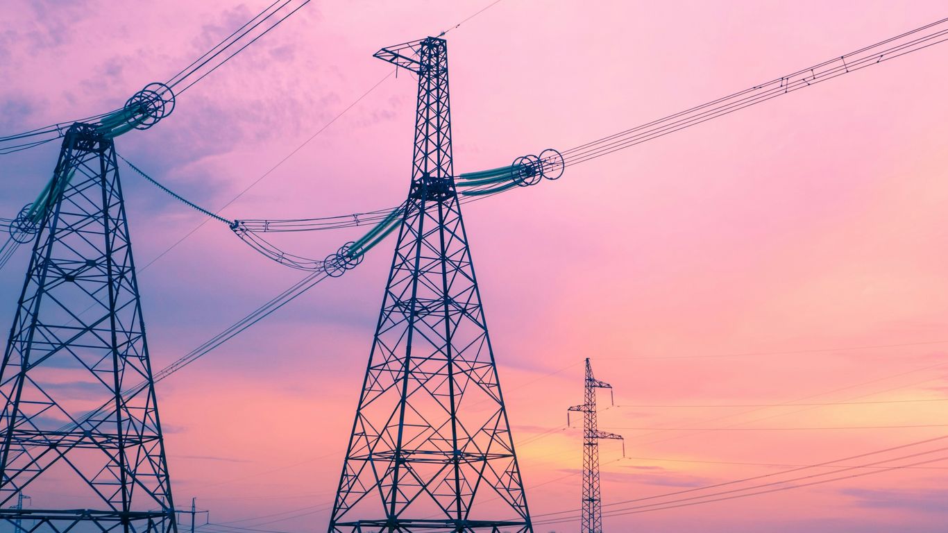 Grid infrastructure with power lines sunset