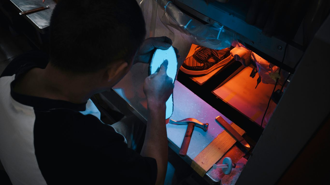 Factory workers assembling products