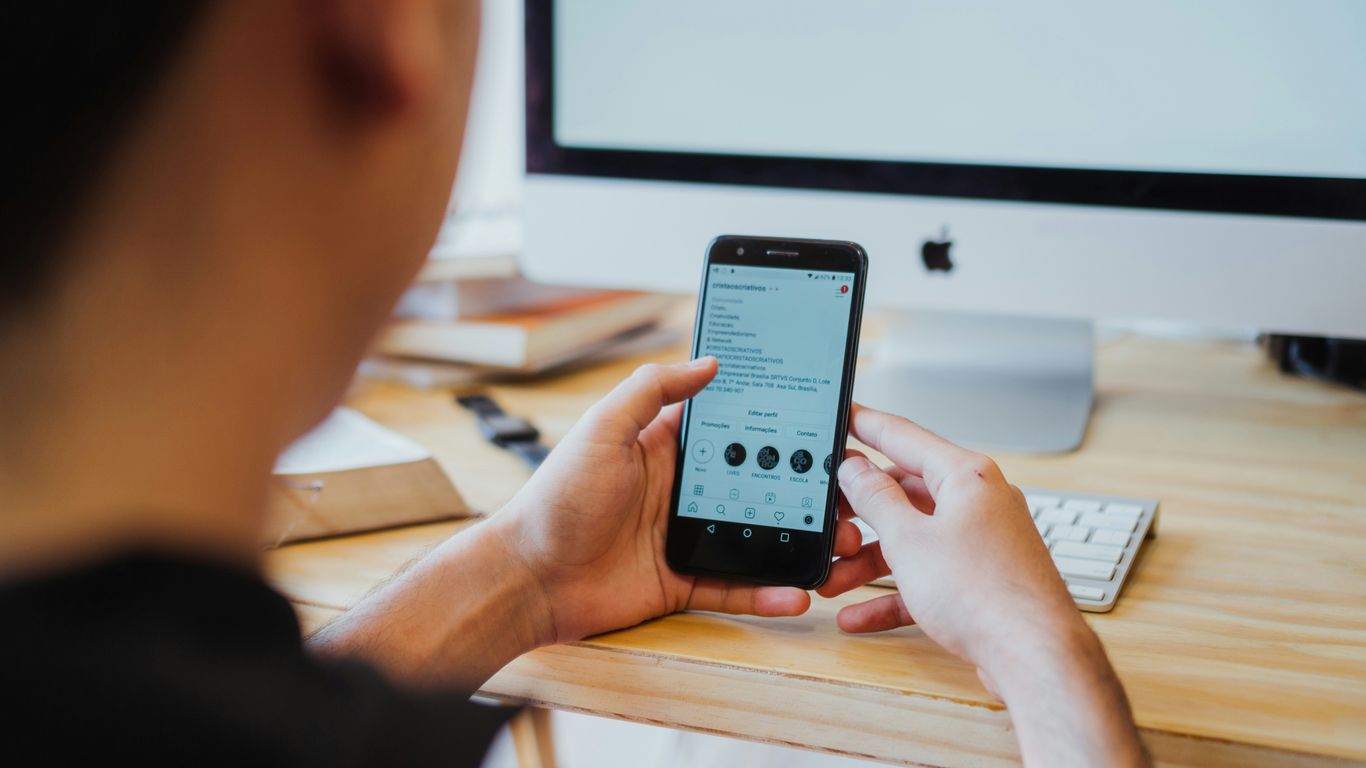 person holding black android smartphone