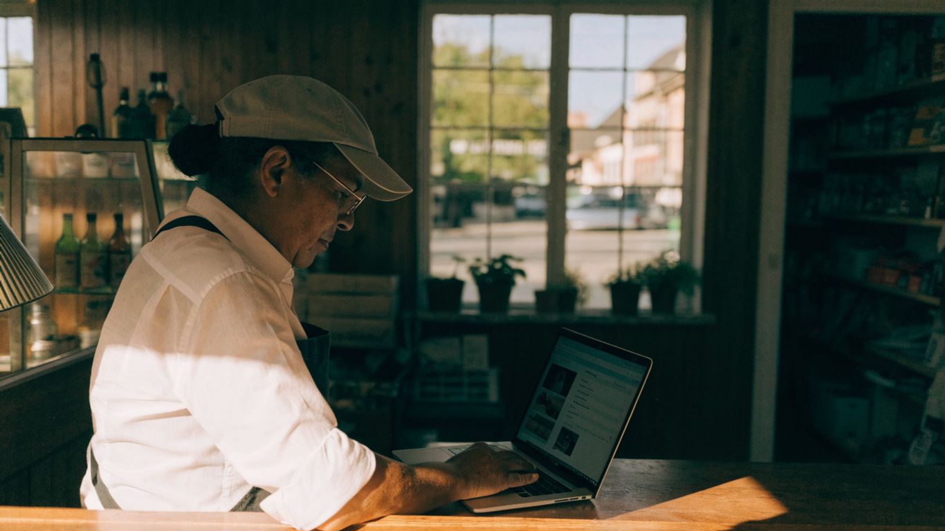 Business owner reviewing a local business profile