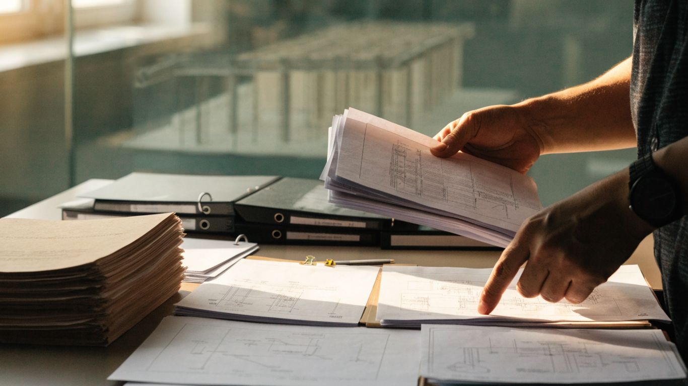 Engineer organizing project evidence for an application