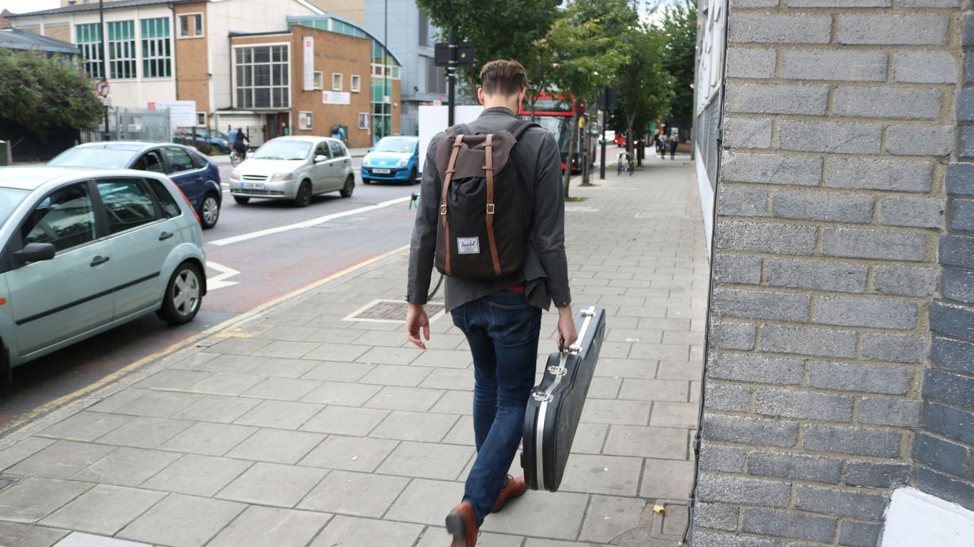 Courier carrying a secure travel case
