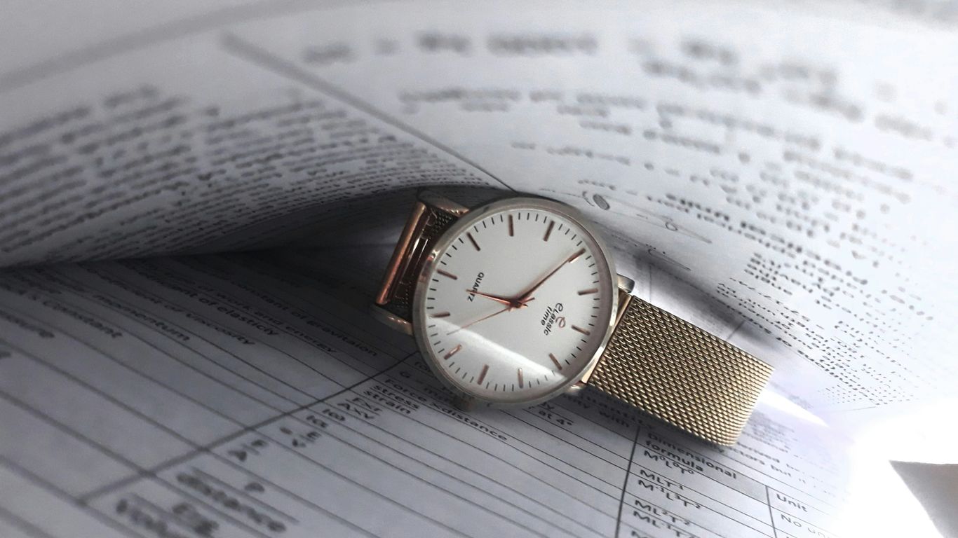 round white analog watch