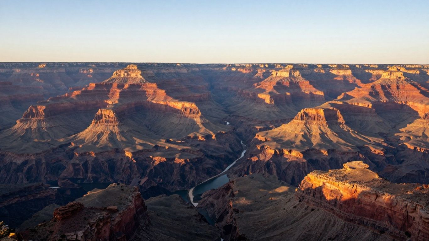 Layered Grand Canyon cliffs at sunrise