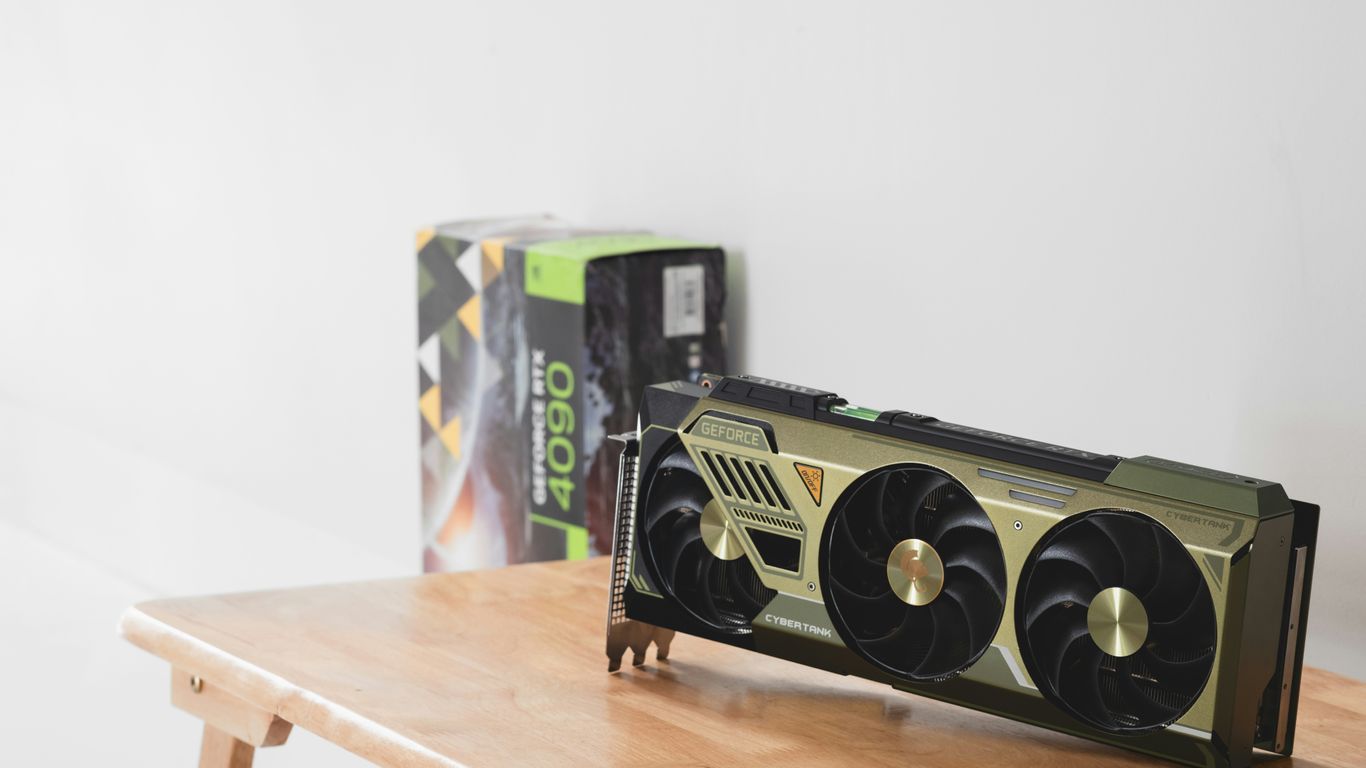 A wooden table topped with a radio next to a box