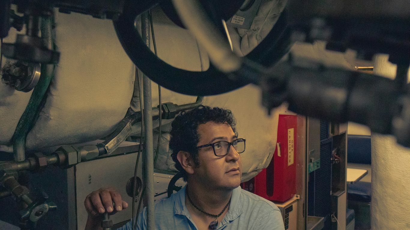 man wears black frame eyeglasses