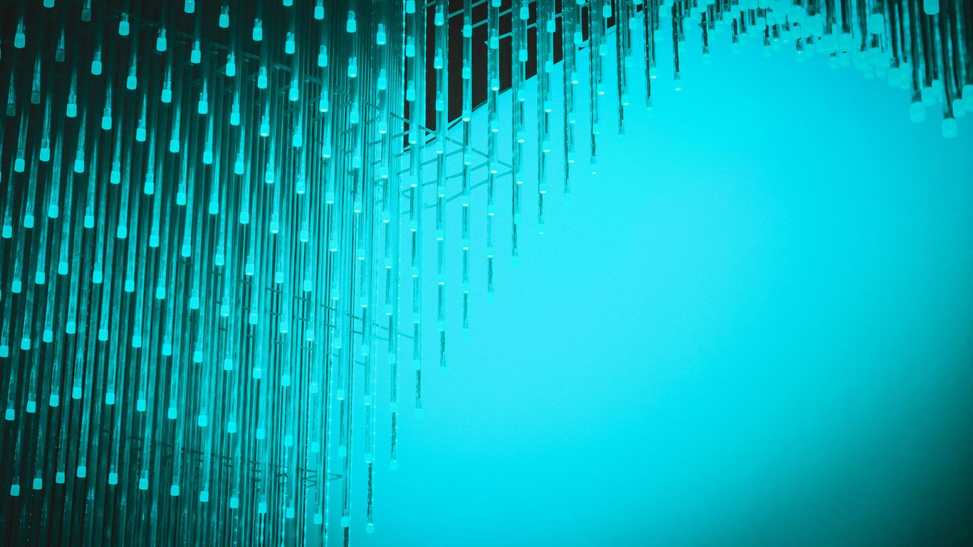 Abstract glowing blue lines forming a wave pattern