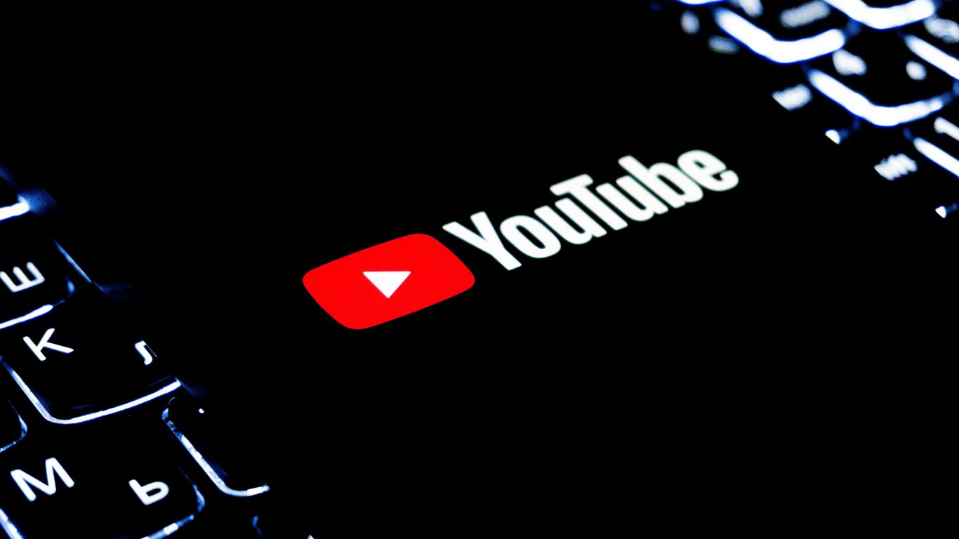 Youtube logo on a dark keyboard