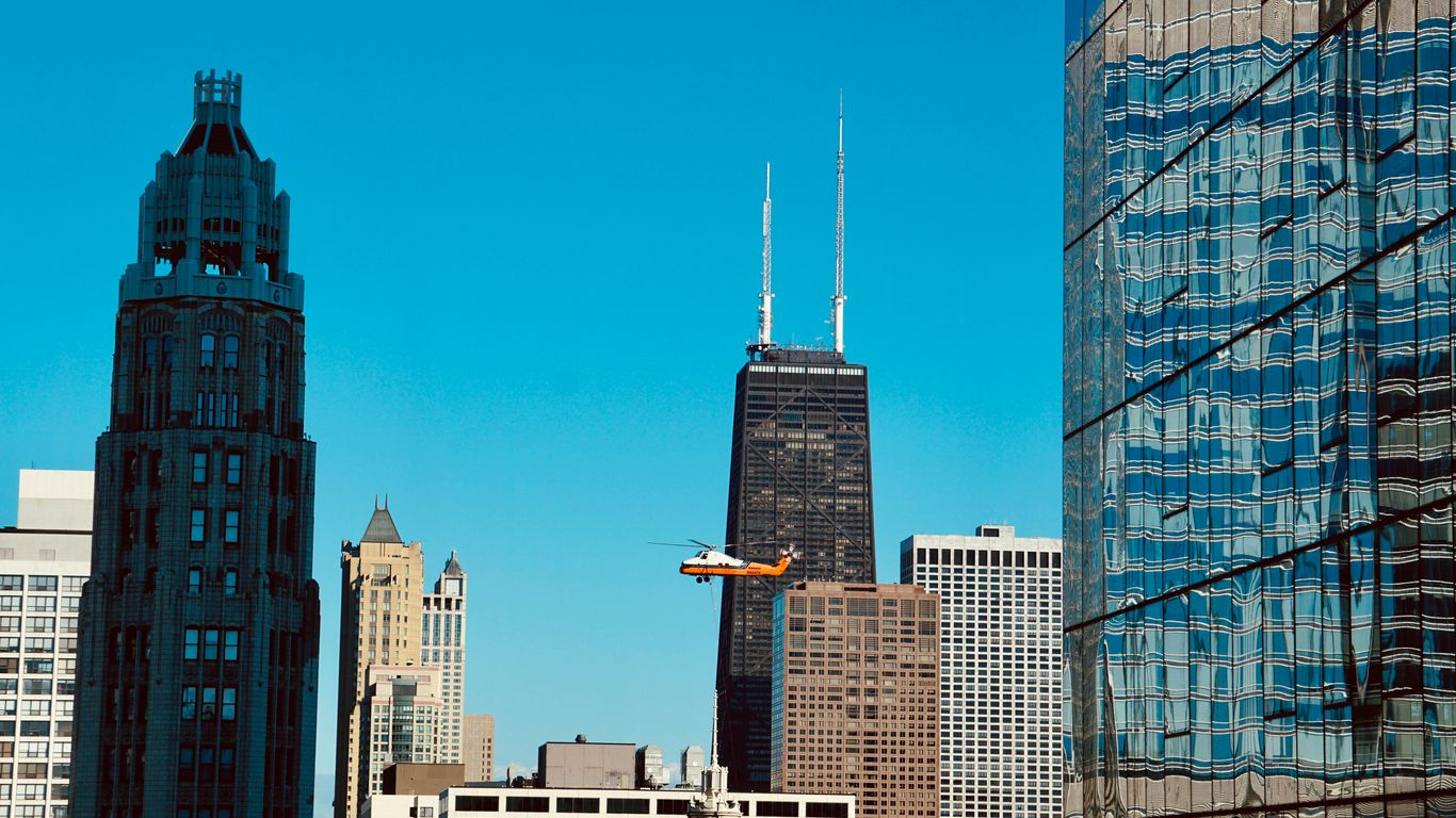 high rise buildings under blue sky during daytime